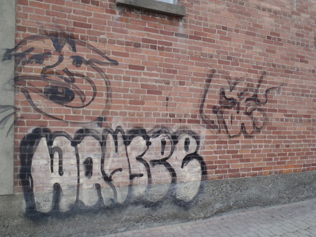 Graffiti tags on Universal Reproductions are slated for cleanup.