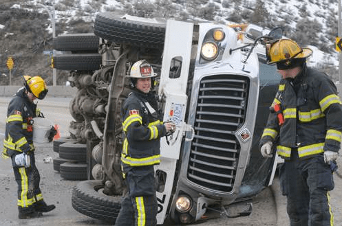 Garbage truck rolled over on Summit Connector last year. (Kamloops Daily News photo)