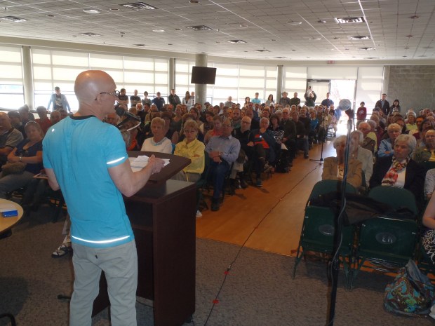 Richard Boyce speaks to capacity crowd at Parkside Lounge.