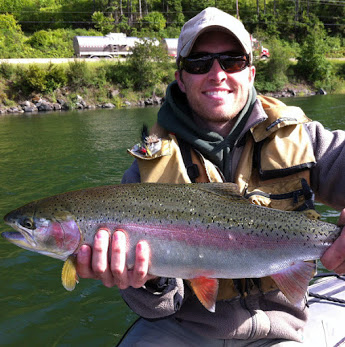 Matt Jennings, executive director of the Kamloops-based B.C. Fishing Resorts and Outfitters Association, hefts a freshly caught rainbow trout.