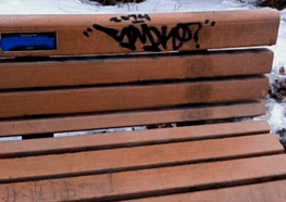 Vandalized bench.