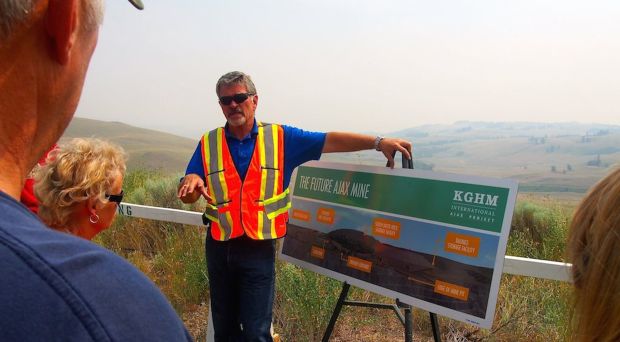 Ajax tour host Kim Behrns talks to residents during visit to minesite Thursday.