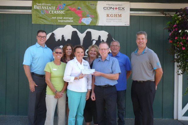 KGHM Ajax, Con-Ex Contractors and Sun Rivers Golf Course representatives present $21,150 cheque to the Marjorie Willoughby Hospice House.