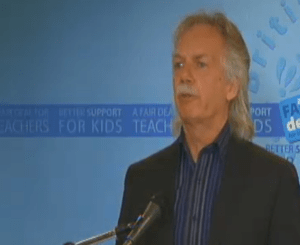 Jim Iker at media conference.