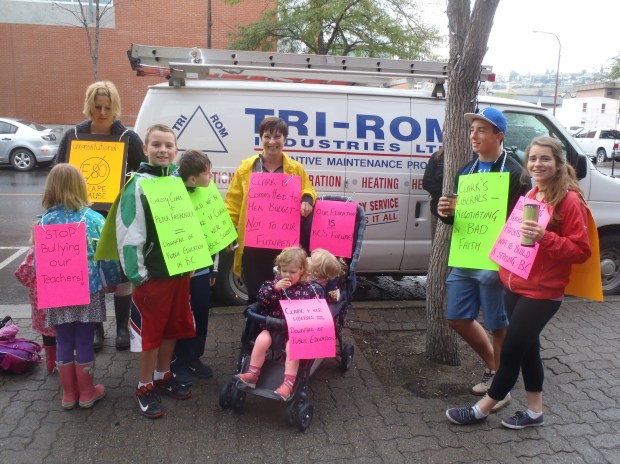Some of the placards at rally.
