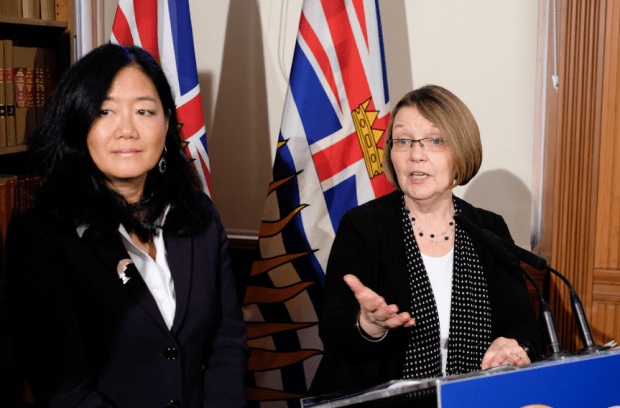 Minister of Sate Naomi Yamamoto (left) and Shirley Bond, minister responsible for labour.
