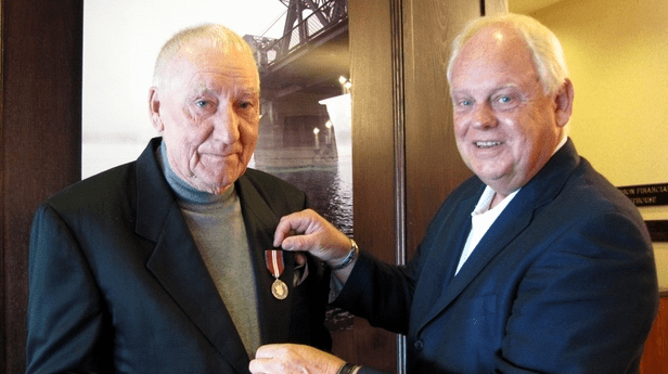 Ben Meisner (left) received Queen’s Diamond Jubilee Medal from Cariboo-Prince George MP Dick Harris in 2013. (250 News photo)