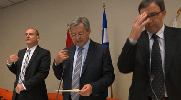 Councillors in Saguenay, Que., make the sign of the cross and recite a 20-second prayer at every council meeting. (CBC Archives)