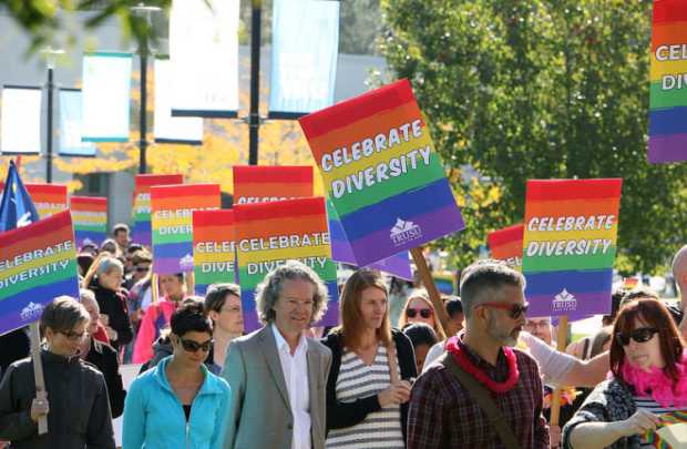 TRU president Alan Shaver walks in Pride Parade.