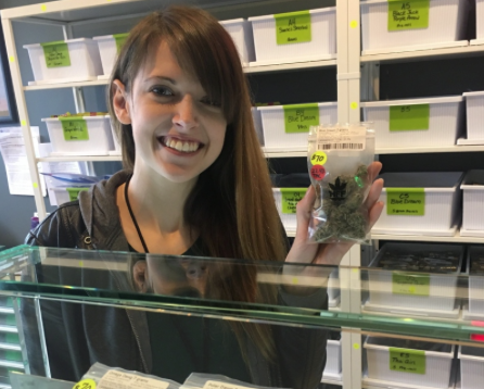 Kelsi Hutchins behind the counter at Mr. Buds in Port Angeles. 