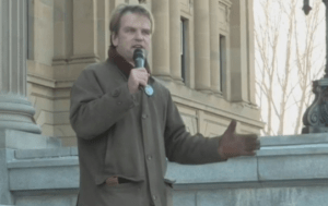 Chris Alexander at rally.