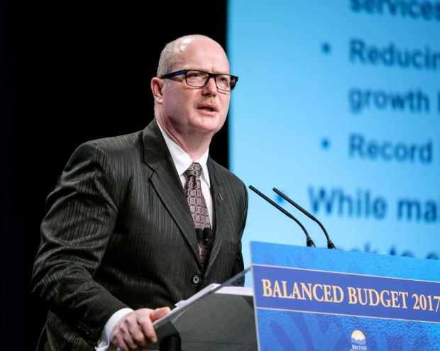 Finance Minister Mike de Jong unveils his budget. (BC Govt photo)