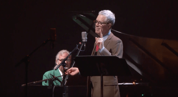 Stuart McLean on stage. (Screengrab, CBC)