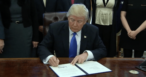 trumpdonald-signing-screengrab